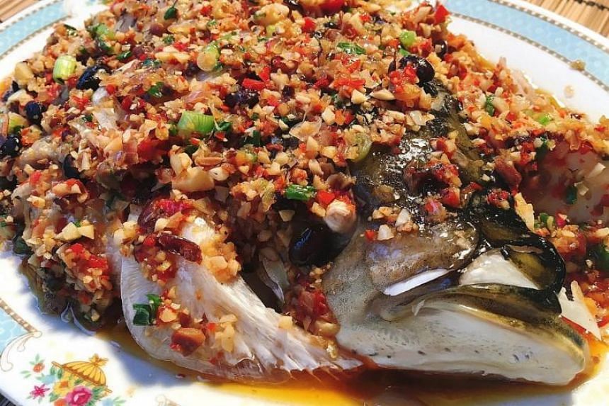 Steamed song fish head with black bean sauce.