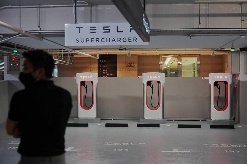 Tesla superchargers at Orchard Central carpark on July 19, 2021.