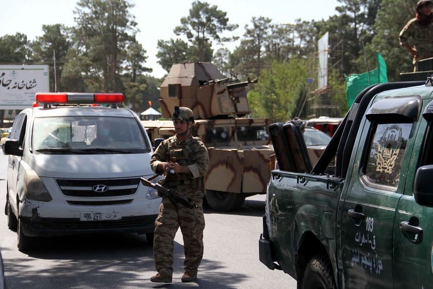 Afghan security officials patrol after they took back control of parts of Herat city following intense battle with Taleban militants, on Aug 7, 2021.