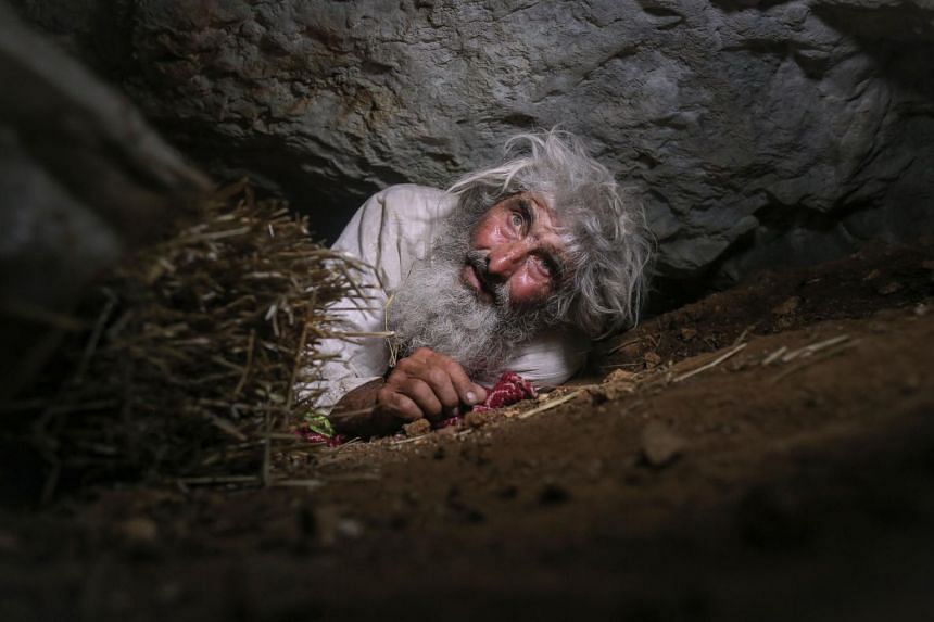 Serbian cave hermit gets Covid-19 vaccine, urges others to follow, Europe  News & Top Stories - The Straits Times