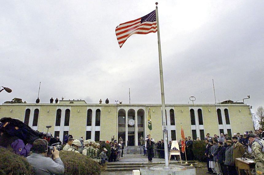A 2001 photo shows a flag-raising ceremony for the opening of the US embassy in the Afghan capital of Kabul.