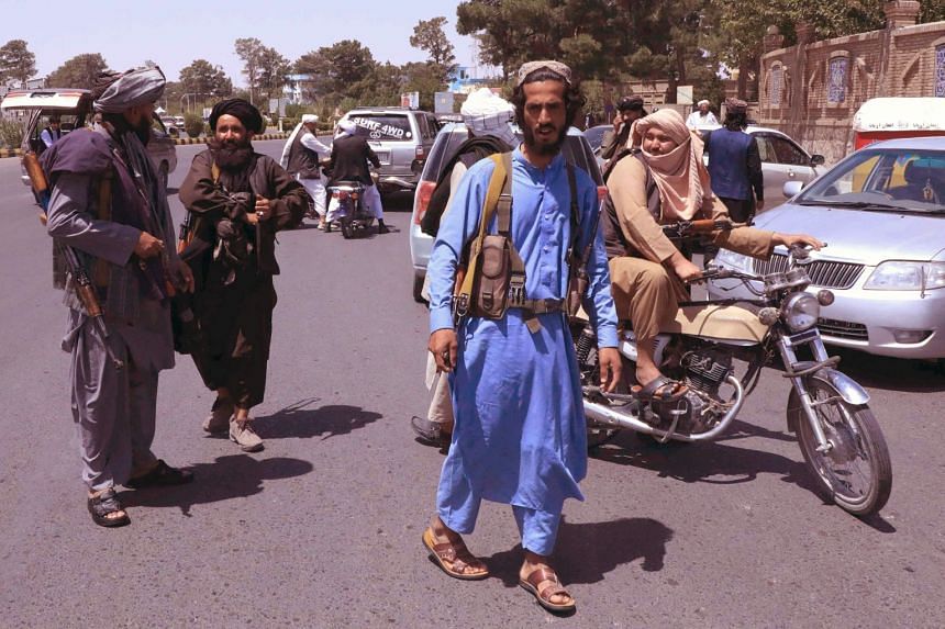 Taleban fighters patrol the streets in Herat on Aug 14, 2021.