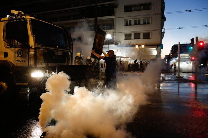 Greek police fire tear gas as 7,000 protest coronavirus vaccine rules,  Europe News &amp; Top Stories - The Straits Times