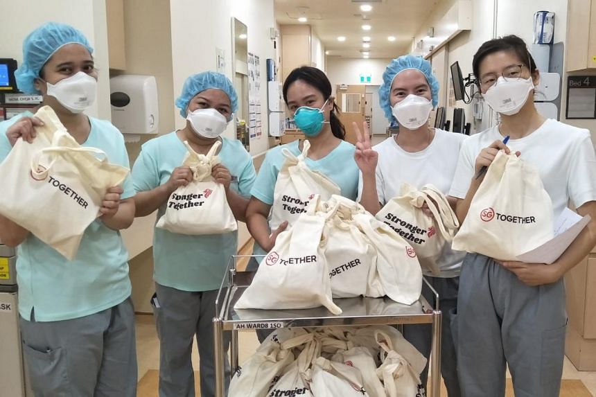 Healthcare workers at Alexandra Hospital with their care packs.