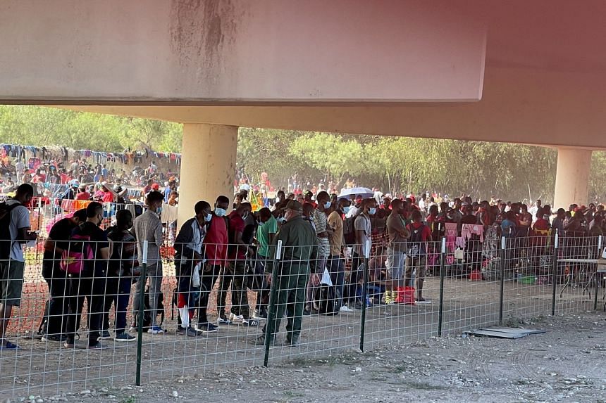 Over 10,000 mostly Haitian migrants sleeping under Texas bridge, more expected