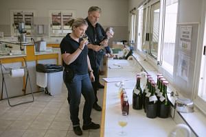 Helene Barre, an oenologist, tastes new season wine at a cooperative in Limoux, France, on Aug 27, 2021.
