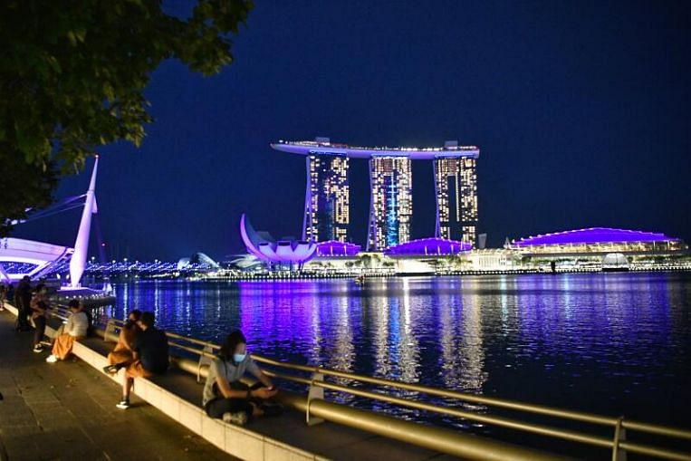Singapore landmarks turn blue to mark World Water Day - The Straits Times