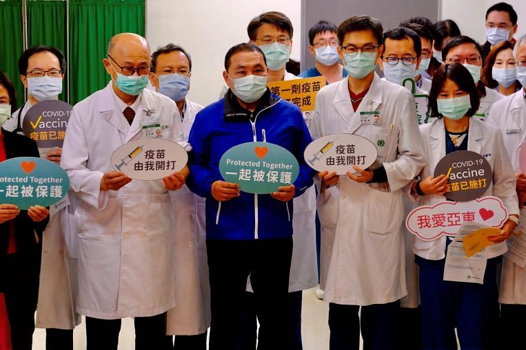 Taiwan premier gets AstraZeneca shot as island starts Covid-19 vaccine campaign