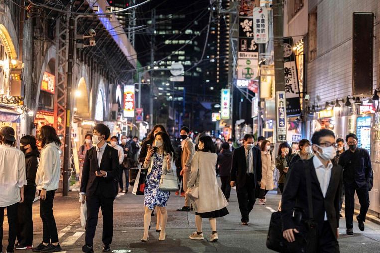Japan's services prices rebound but outlook clouded by new ...