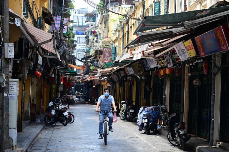 Vietnam to expand movement curbs as Covid-19 cases hit record high