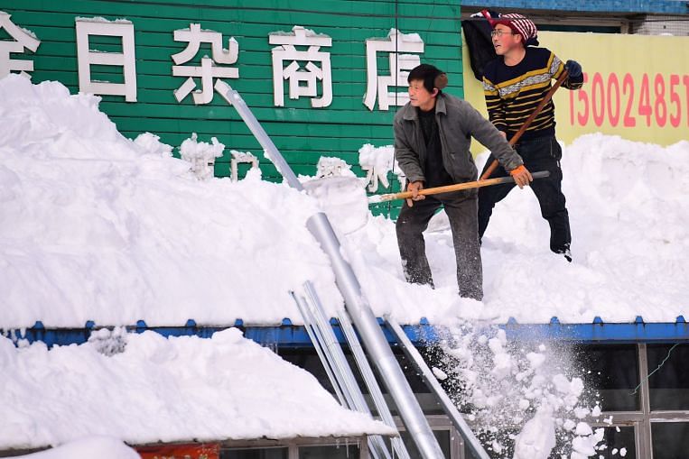 Beberapa bagian dari timur laut China dilanda hujan salju rekor, East Asia News & Top Stories