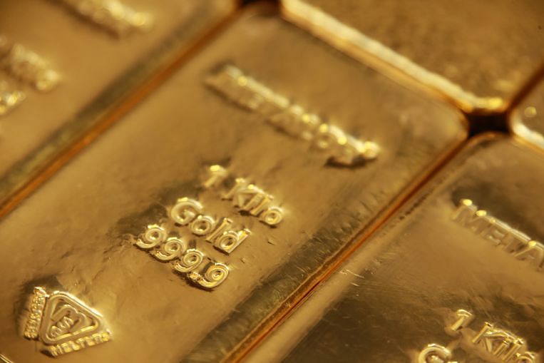 L’or maintient son avance alors que le virus accroît les risques pour la croissance mondiale, Economy News & Top Stories
