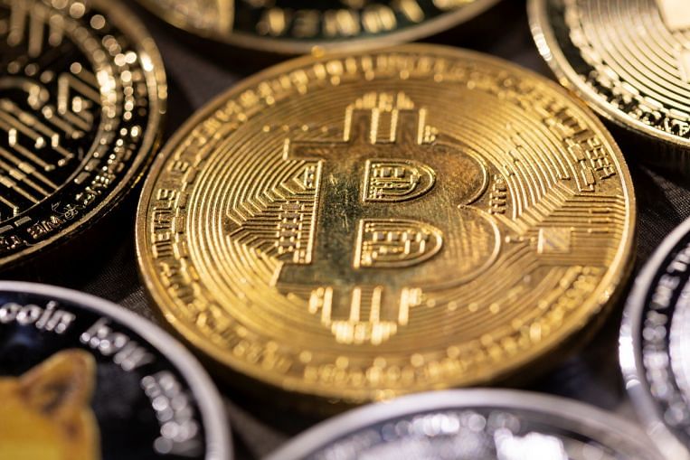 Bitcoin kembali lebih dari US.000, karena pasar tenang setelah gejolak akhir pekan, Companies & Markets News & Top Stories